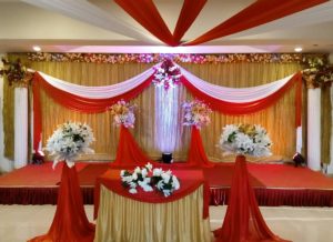 Wedding venue with beautiful flowers and lighting decoration