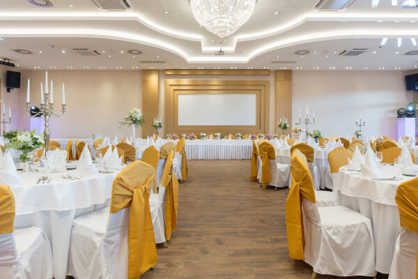 "A beautifully decorated banquet hall illustrates the things to consider when selecting a banquet hall. "