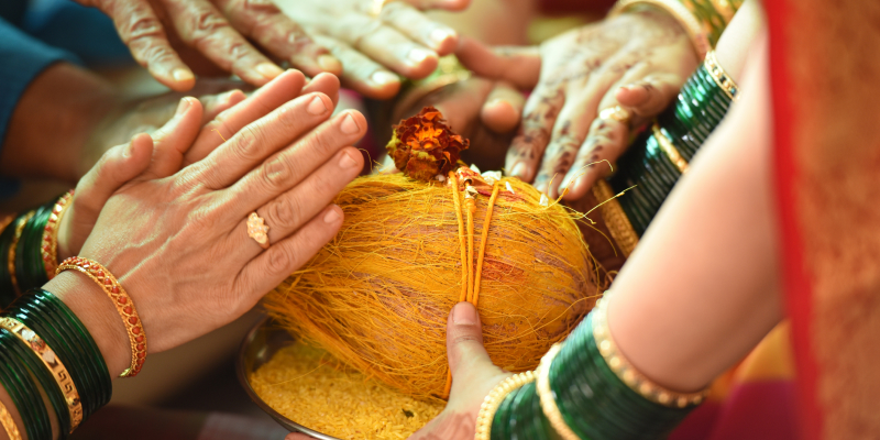 Indian wedding ceremonial events getting blessing from elders illustrates the procedures at sathabhishekam.