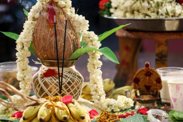 A decorated kalash, pooja items and flower garlands are kept ready for the Kanagabishegam or Navathi celebration.